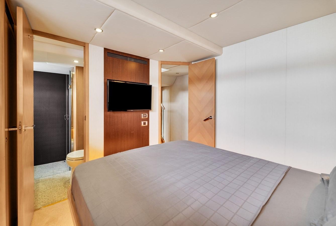 a bedroom with a bed aboard PRINCESS 85 MY Yacht for Sale