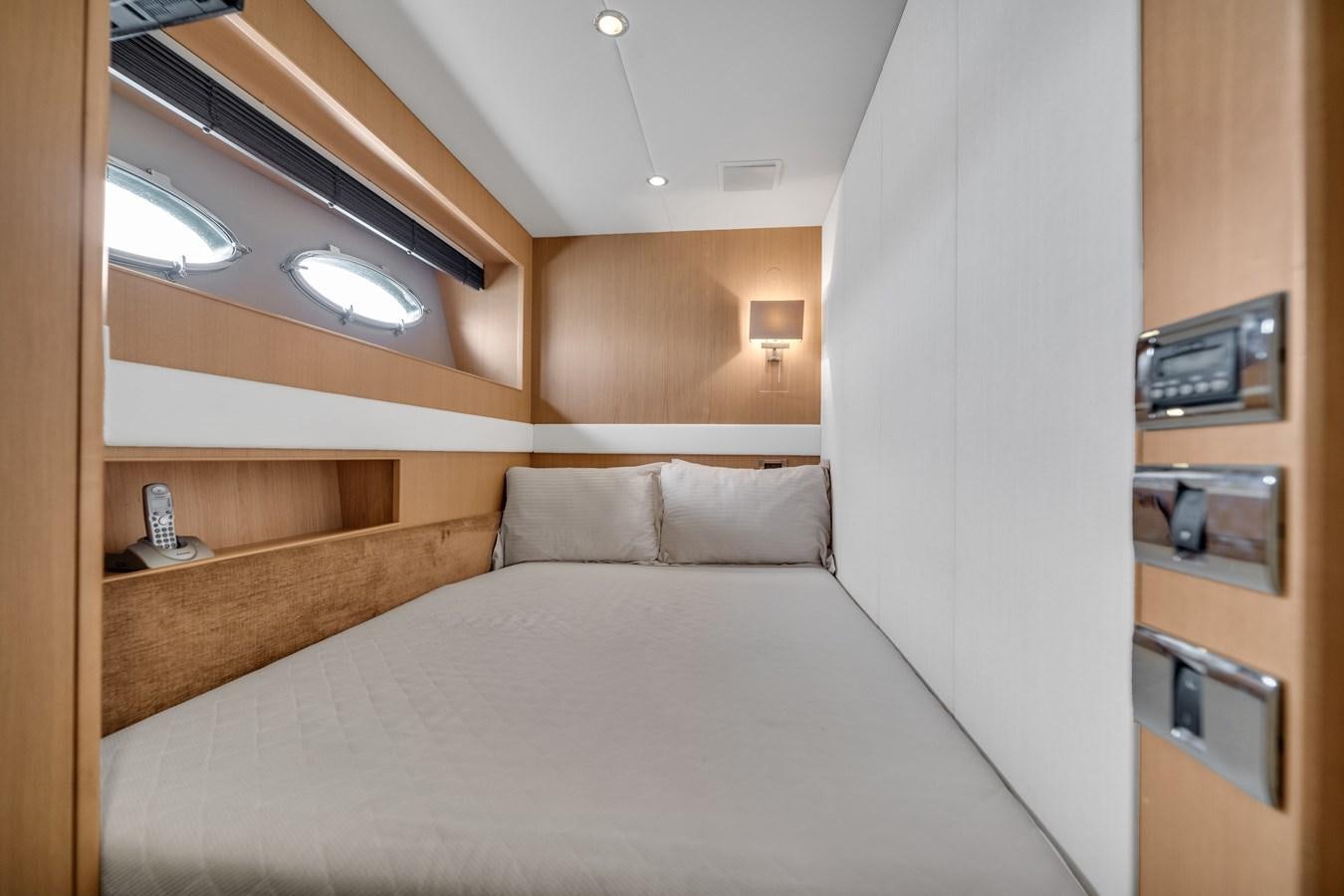 a bed in a room aboard PRINCESS 85 MY Yacht for Sale
