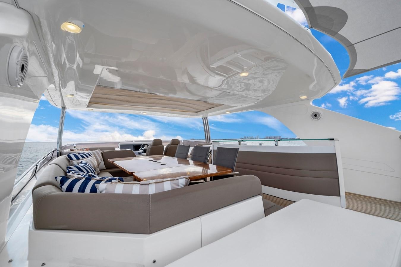 a large room with a bed and a large white bed aboard PRINCESS 85 MY Yacht for Sale