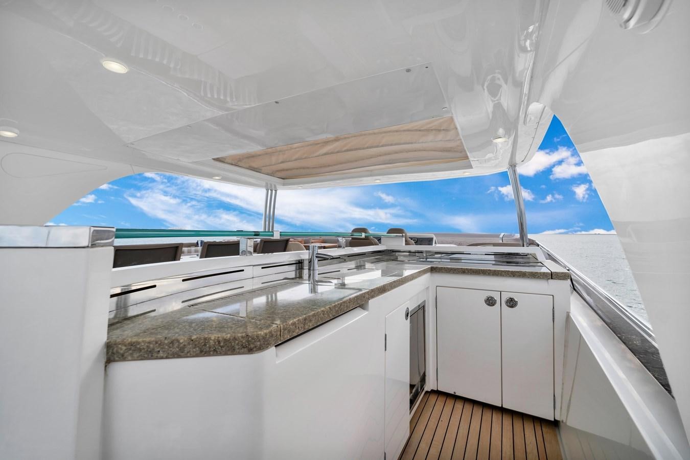 a kitchen with a sink and a fan aboard PRINCESS 85 MY Yacht for Sale