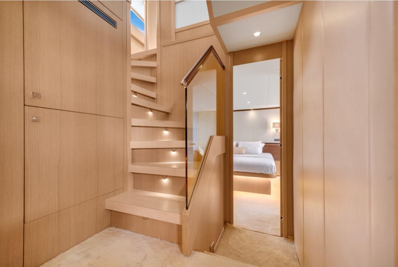 a wooden staircase in a room aboard PRINCESS 85 MY Yacht for Sale
