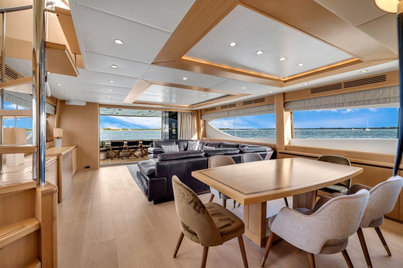 a room with a table and chairs aboard PRINCESS 85 MY Yacht for Sale