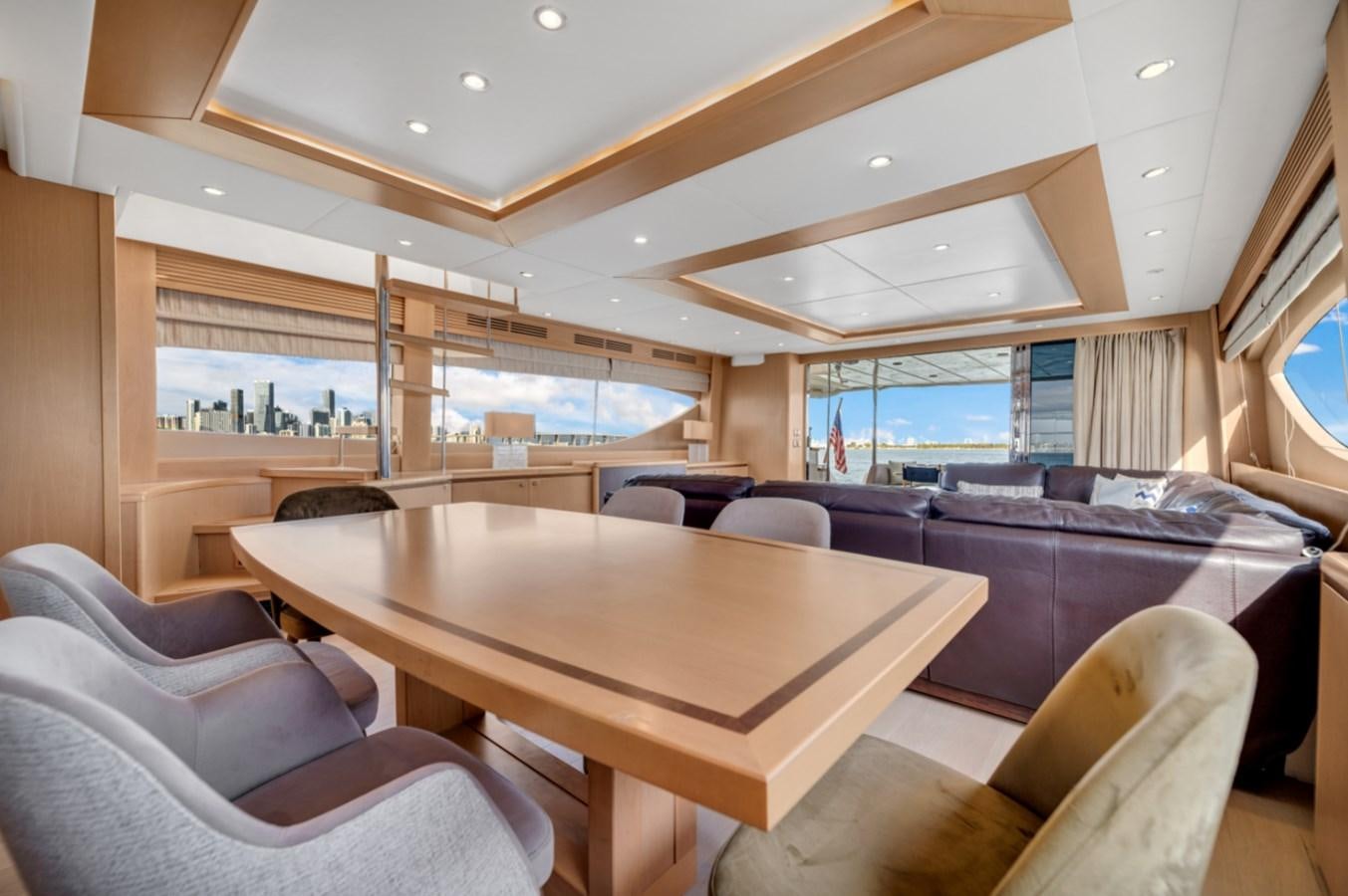 a room with a table and chairs aboard PRINCESS 85 MY Yacht for Sale
