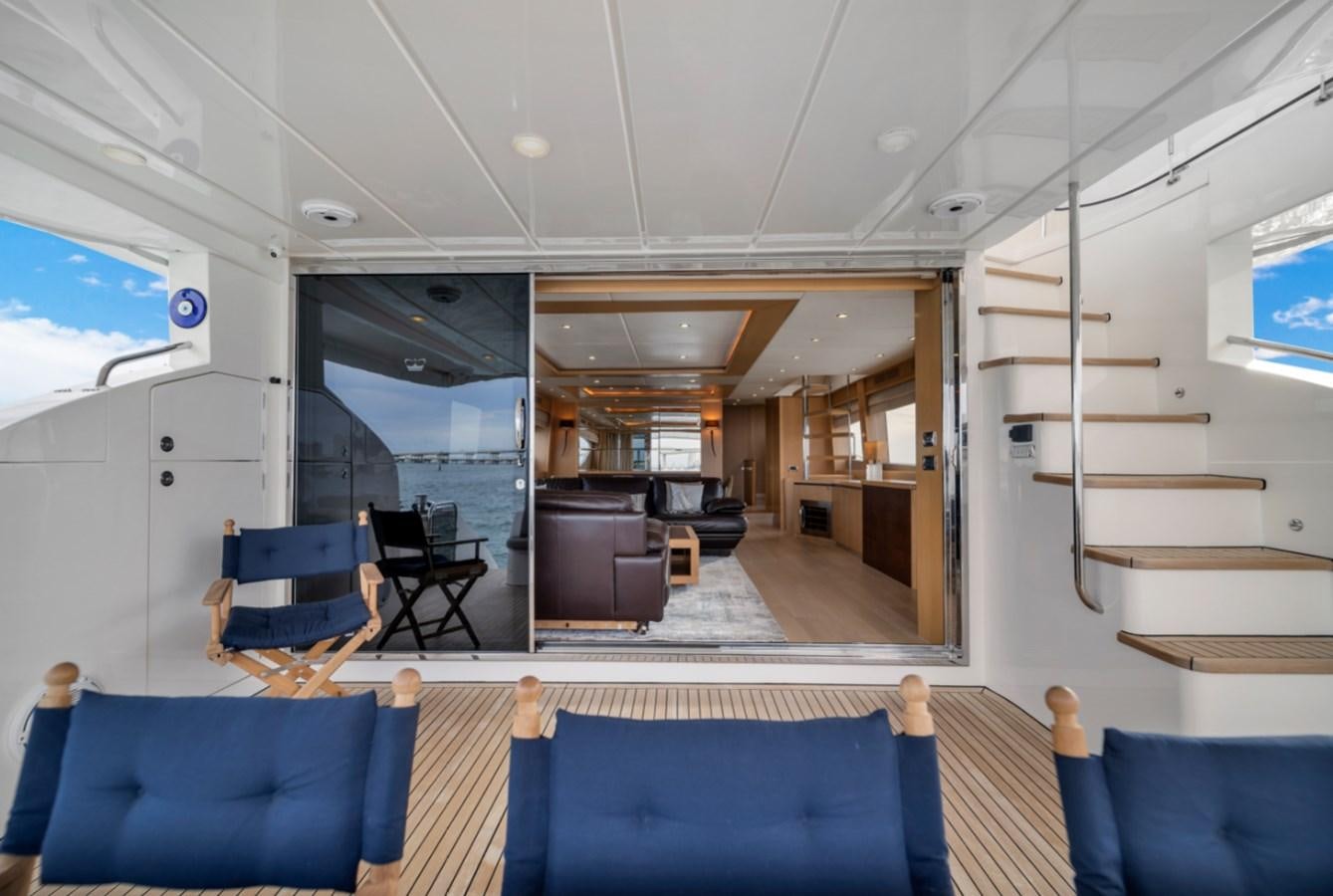 inside of a building with a staircase and a glass wall aboard PRINCESS 85 MY Yacht for Sale