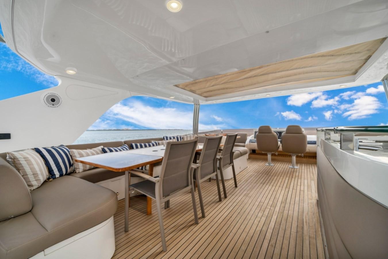 a tent with a table and chairs aboard PRINCESS 85 MY Yacht for Sale
