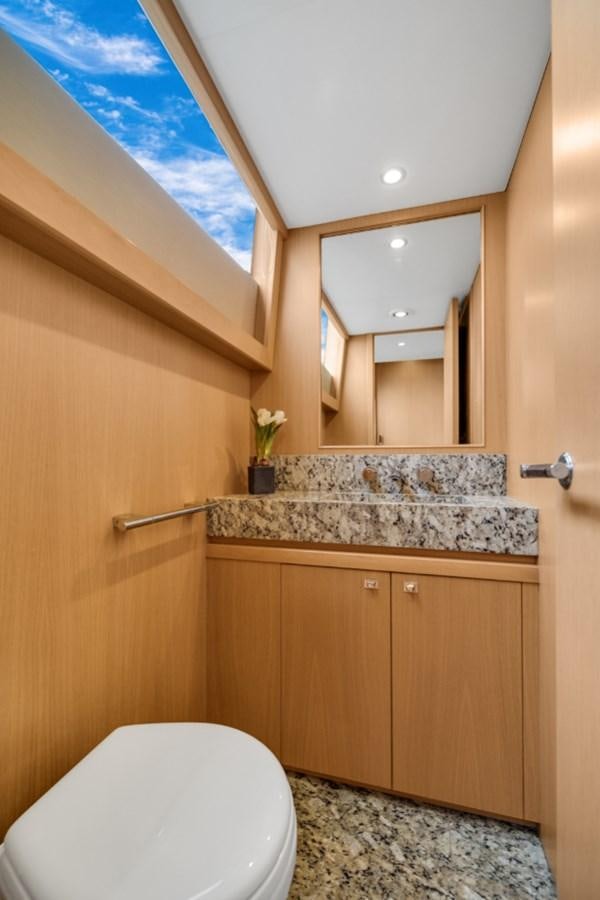 a bathroom with a marble counter top aboard PRINCESS 85 MY Yacht for Sale