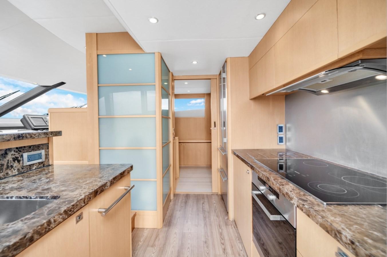 a kitchen with a large countertop aboard PRINCESS 85 MY Yacht for Sale