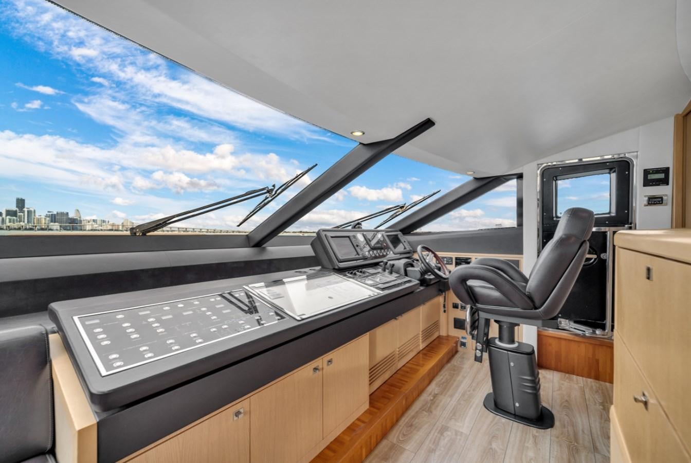a room with a large window aboard PRINCESS 85 MY Yacht for Sale