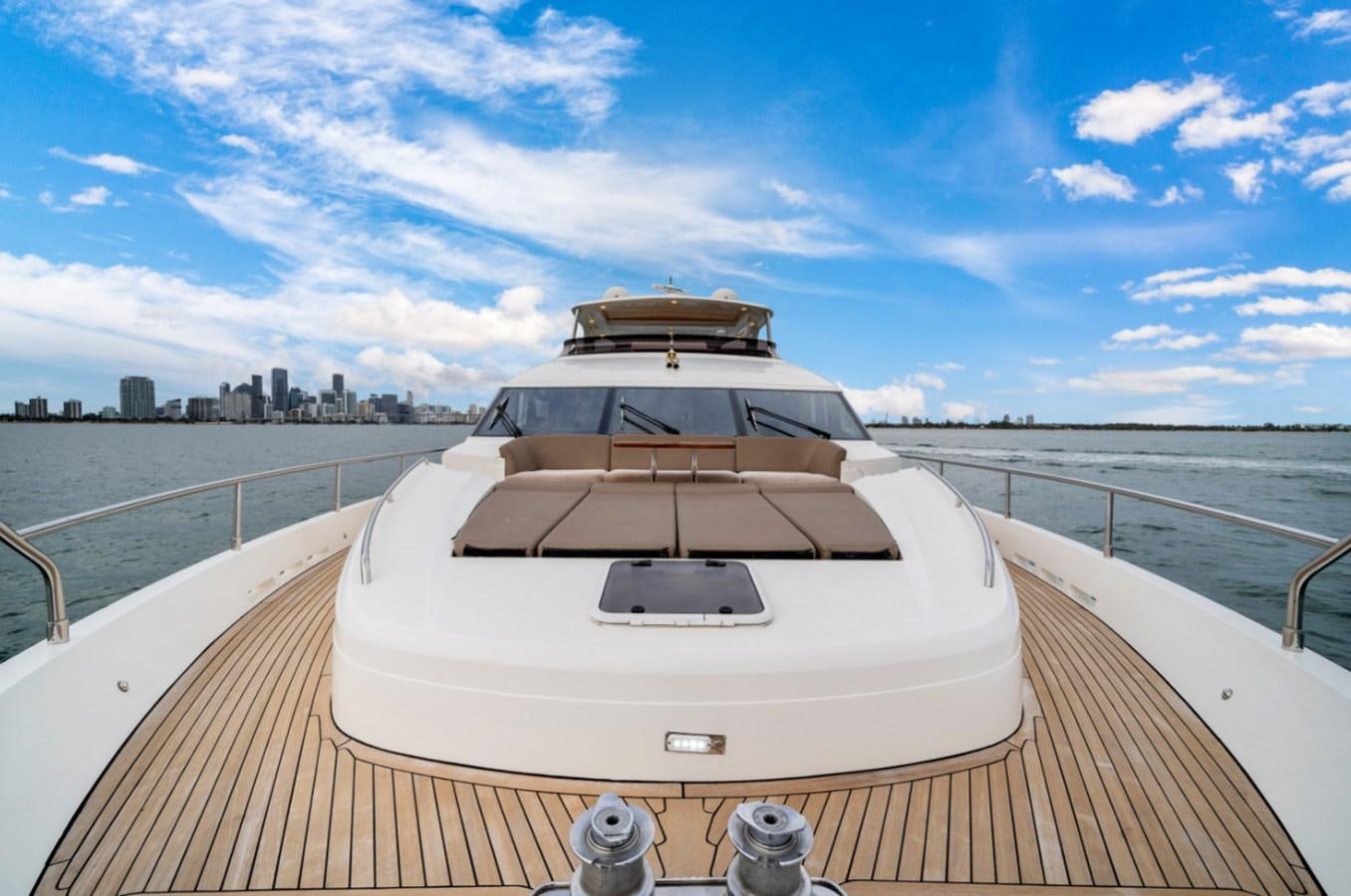 a white car on a bridge aboard PRINCESS 85 MY Yacht for Sale