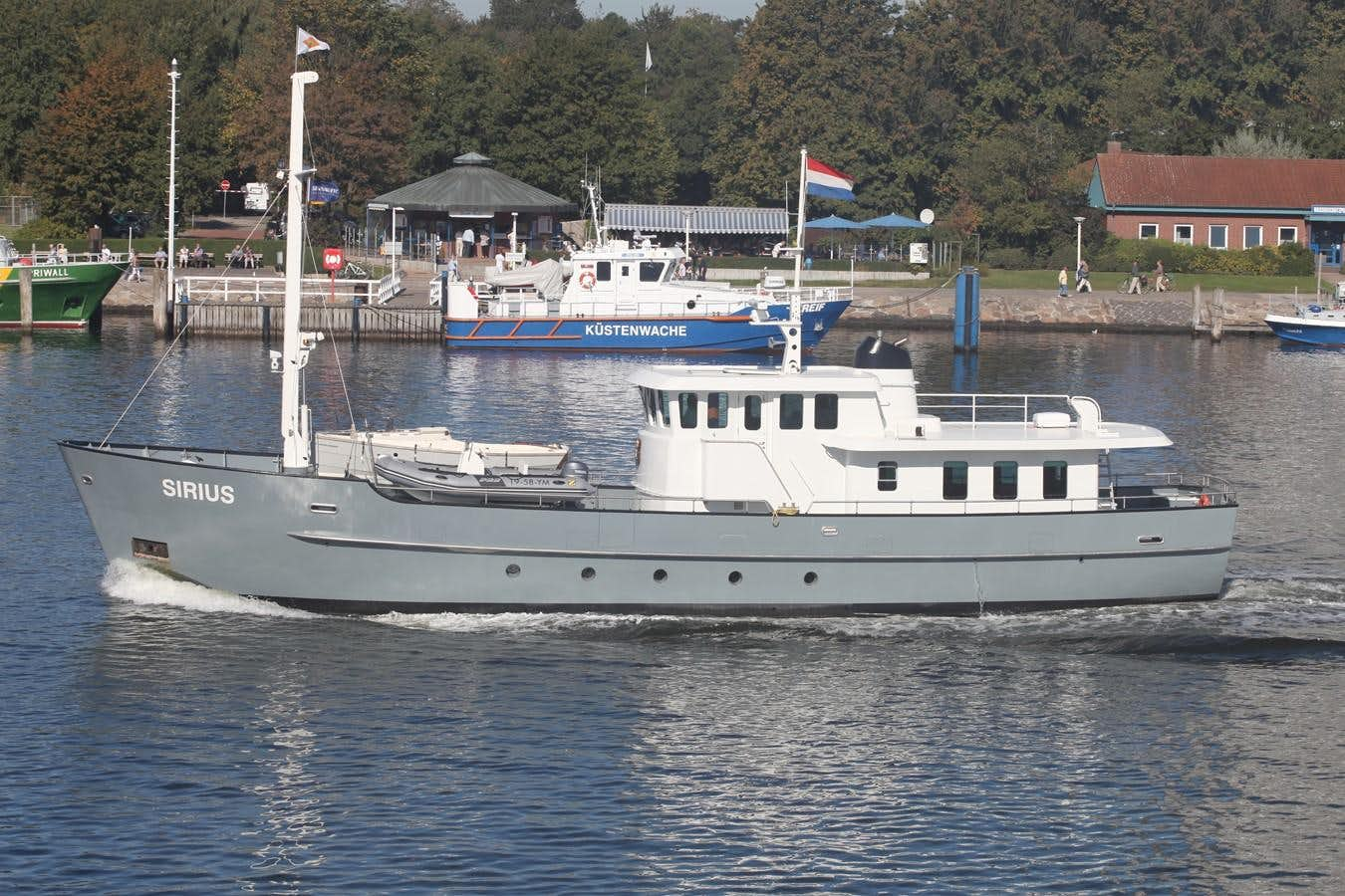 a couple of boats on the water aboard SIRIUS Yacht for Sale