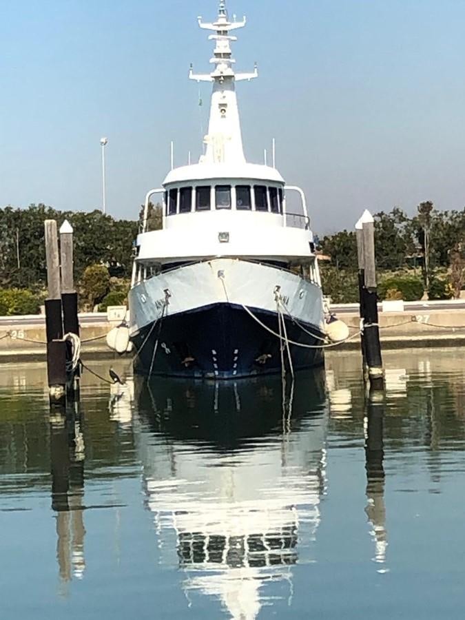 a large white boat docked aboard ANNA I Yacht for Sale