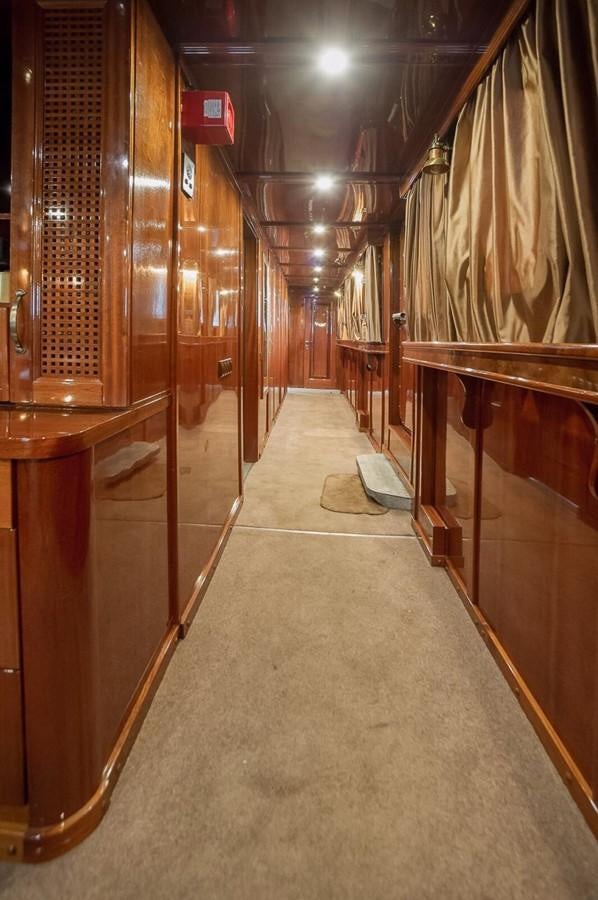 a hallway with wood walls aboard ANNA I Yacht for Sale