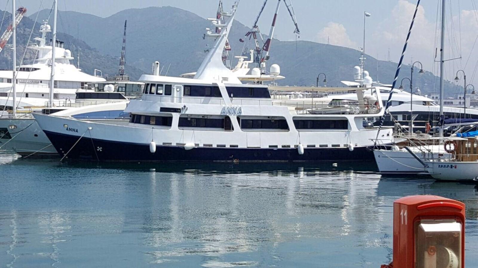 a group of boats are parked in a harbor aboard ANNA I Yacht for Sale