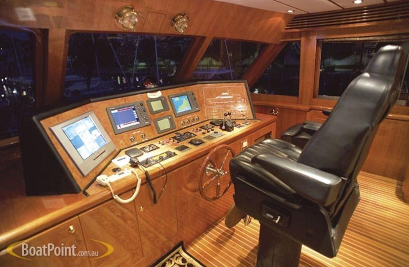 a room with a desk and computer aboard OCEANOS II Yacht for Sale