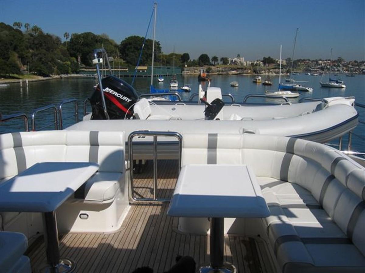 a boat with a person on it aboard OCEANOS II Yacht for Sale