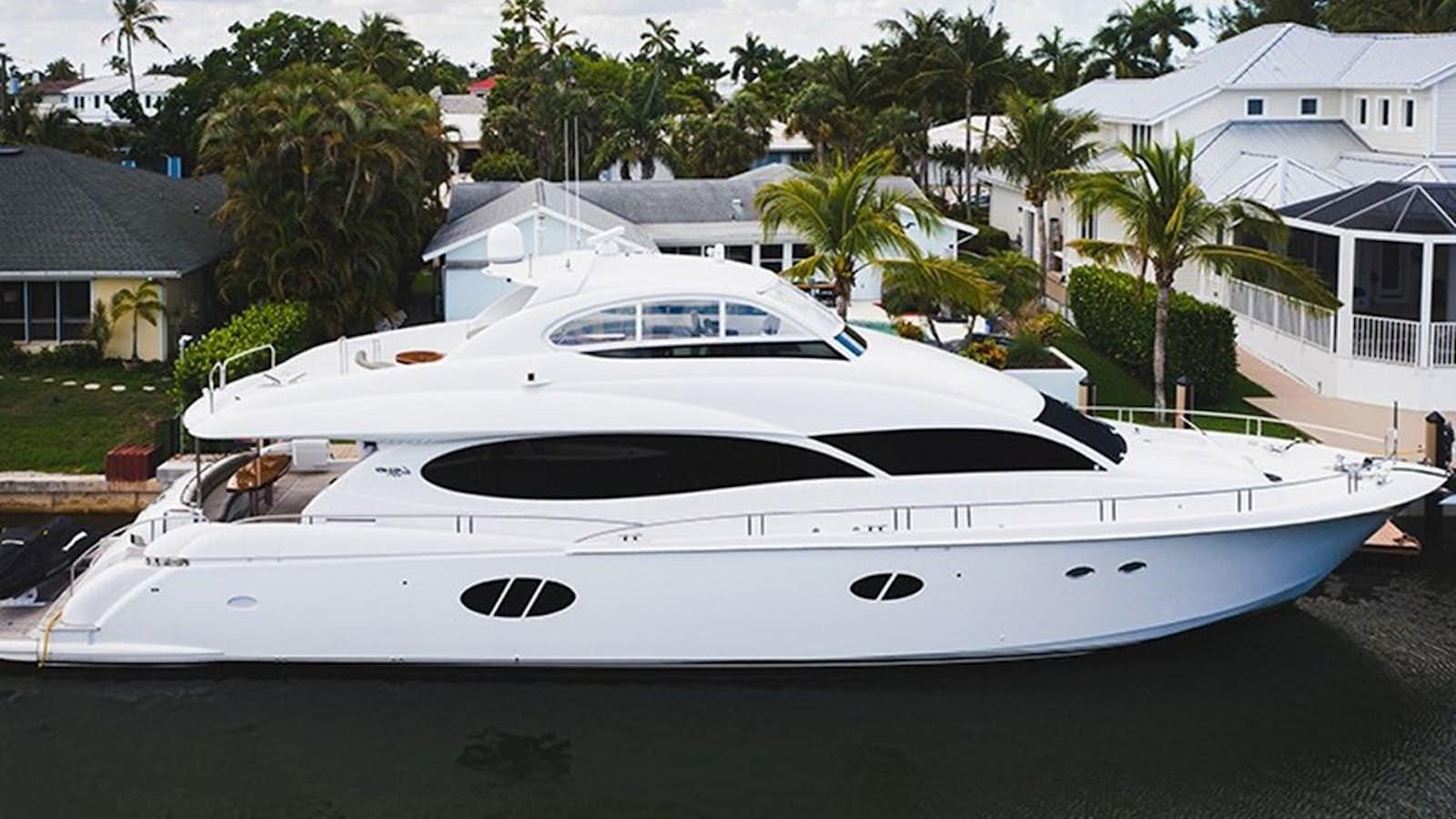 a white yacht in a driveway aboard ENDLESS LOVE Yacht for Sale
