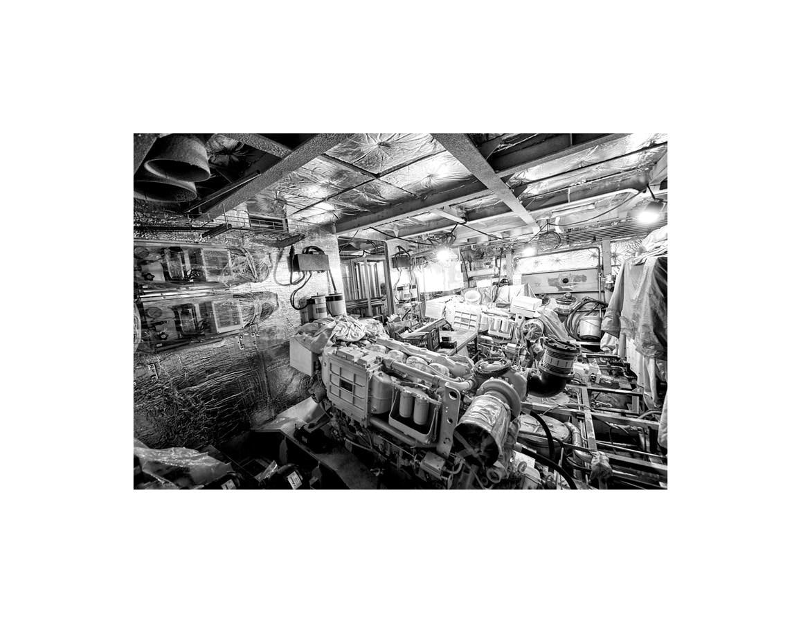 a black and white photo of a destroyed building aboard AUDACE 80 Yacht for Sale