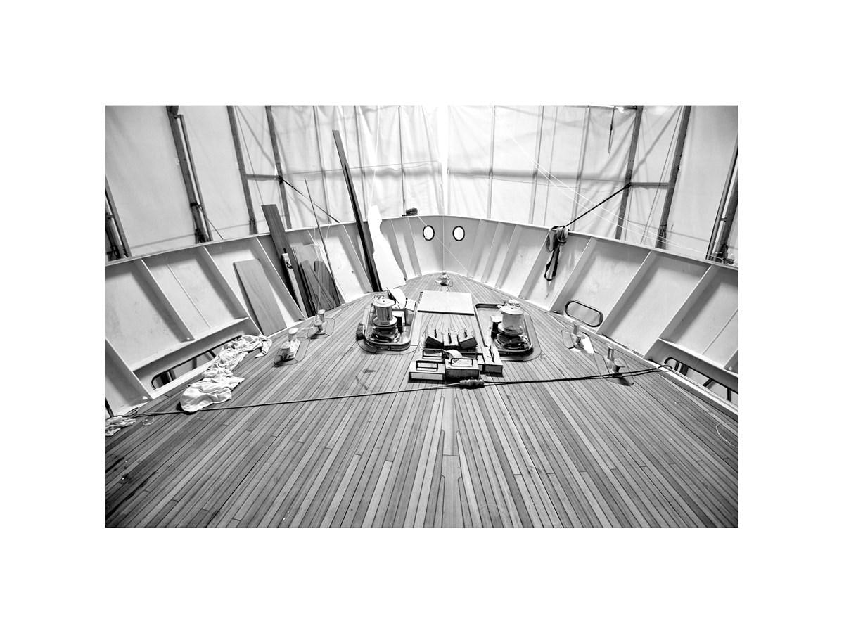 a large building with a curved staircase aboard AUDACE 80 Yacht for Sale