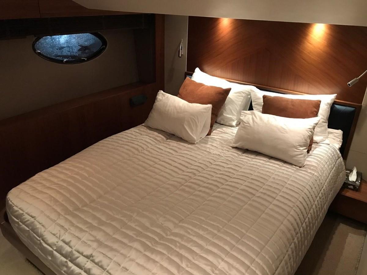 a bed with pillows aboard JUST ANOTHER TOY Yacht for Sale