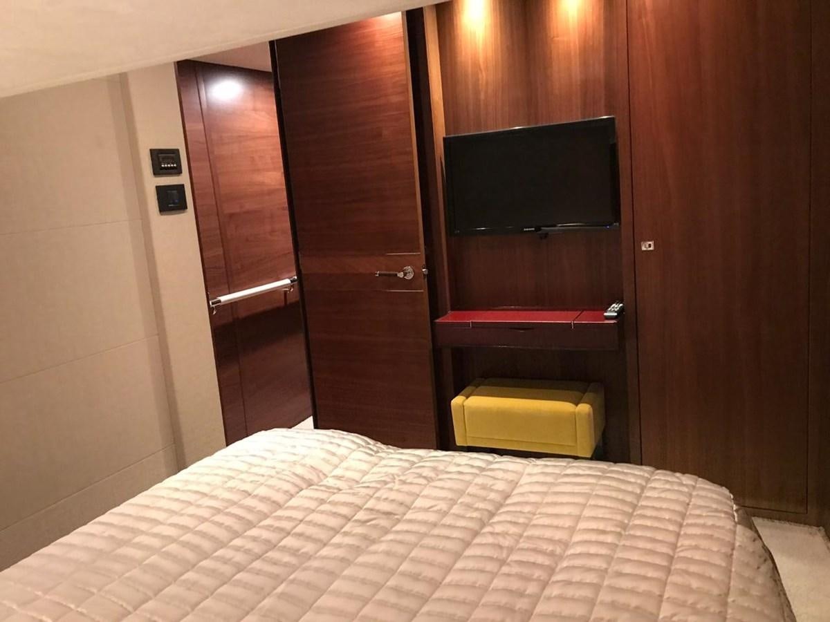 a bed in a room aboard JUST ANOTHER TOY Yacht for Sale