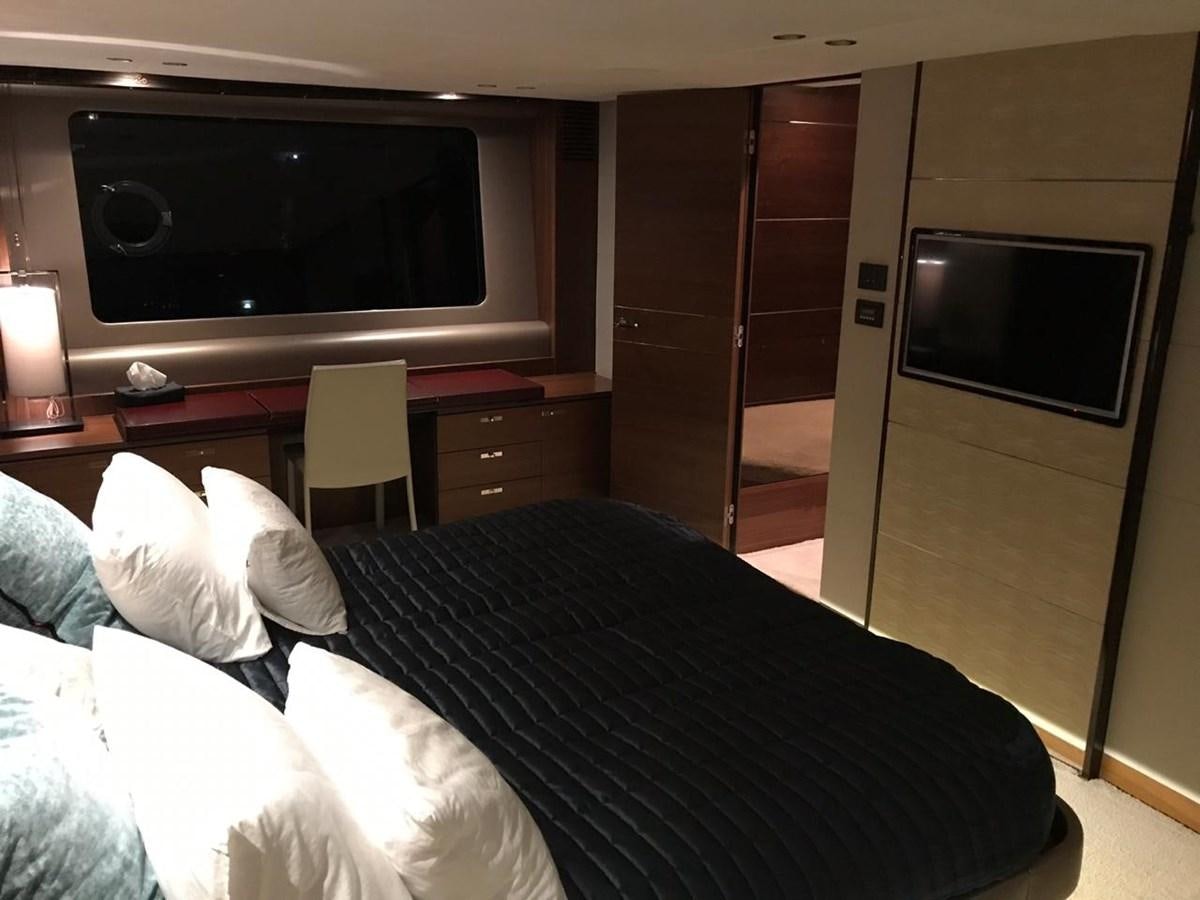 a bed in a room aboard JUST ANOTHER TOY Yacht for Sale