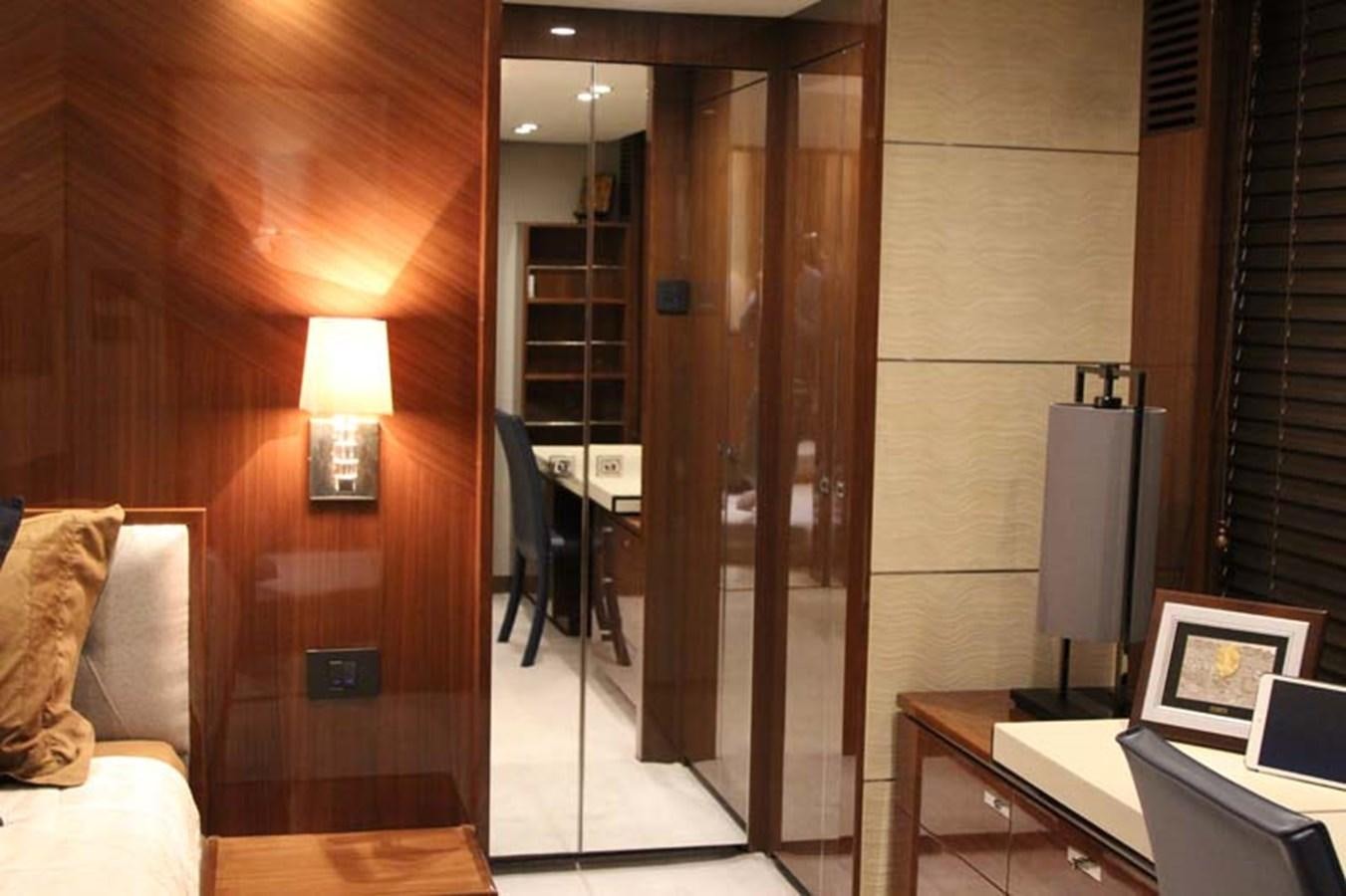 a room with a glass door aboard AQUA CHAMELEON Yacht for Sale