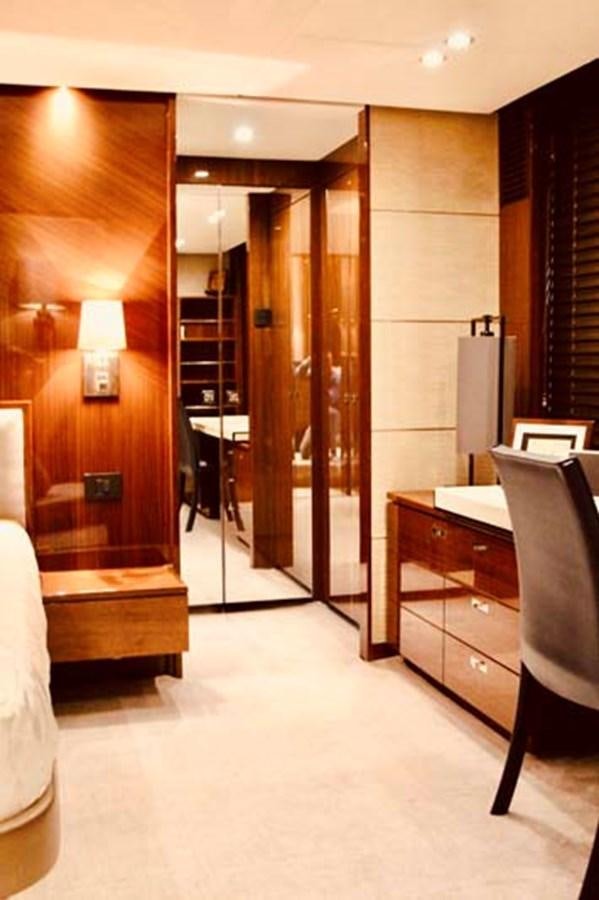 a room with a desk and a chair aboard AQUA CHAMELEON Yacht for Sale