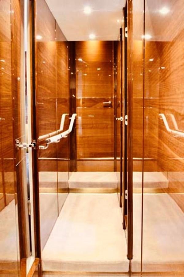 a large glass door aboard AQUA CHAMELEON Yacht for Sale