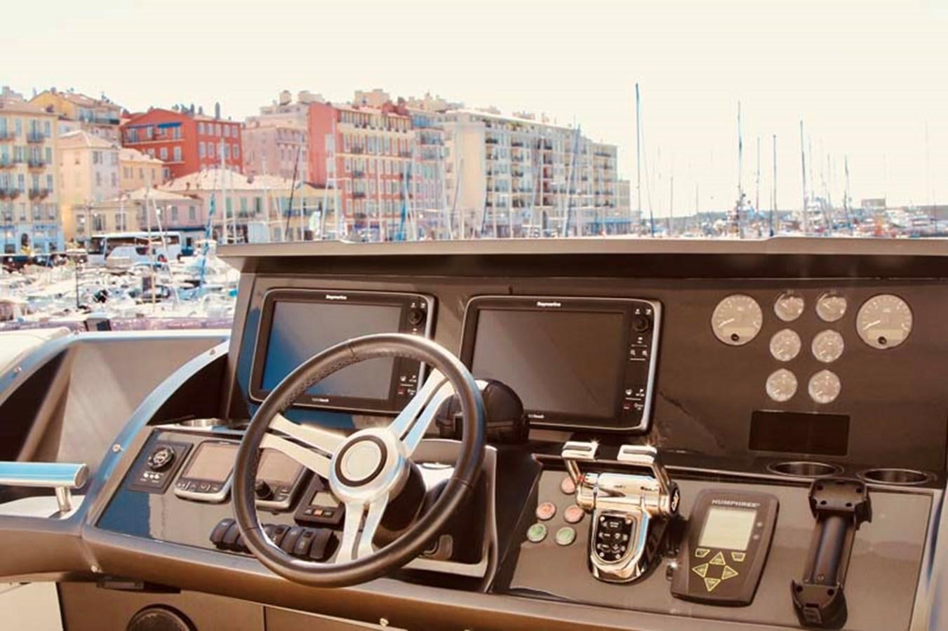 a view of a city from the cockpit of a plane aboard AQUA CHAMELEON Yacht for Sale