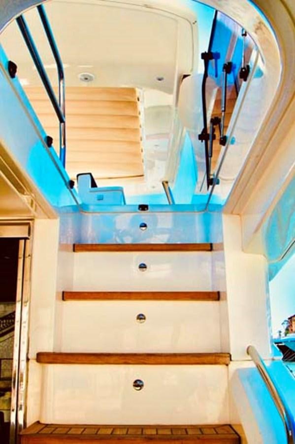 a white cabinet with doors aboard AQUA CHAMELEON Yacht for Sale