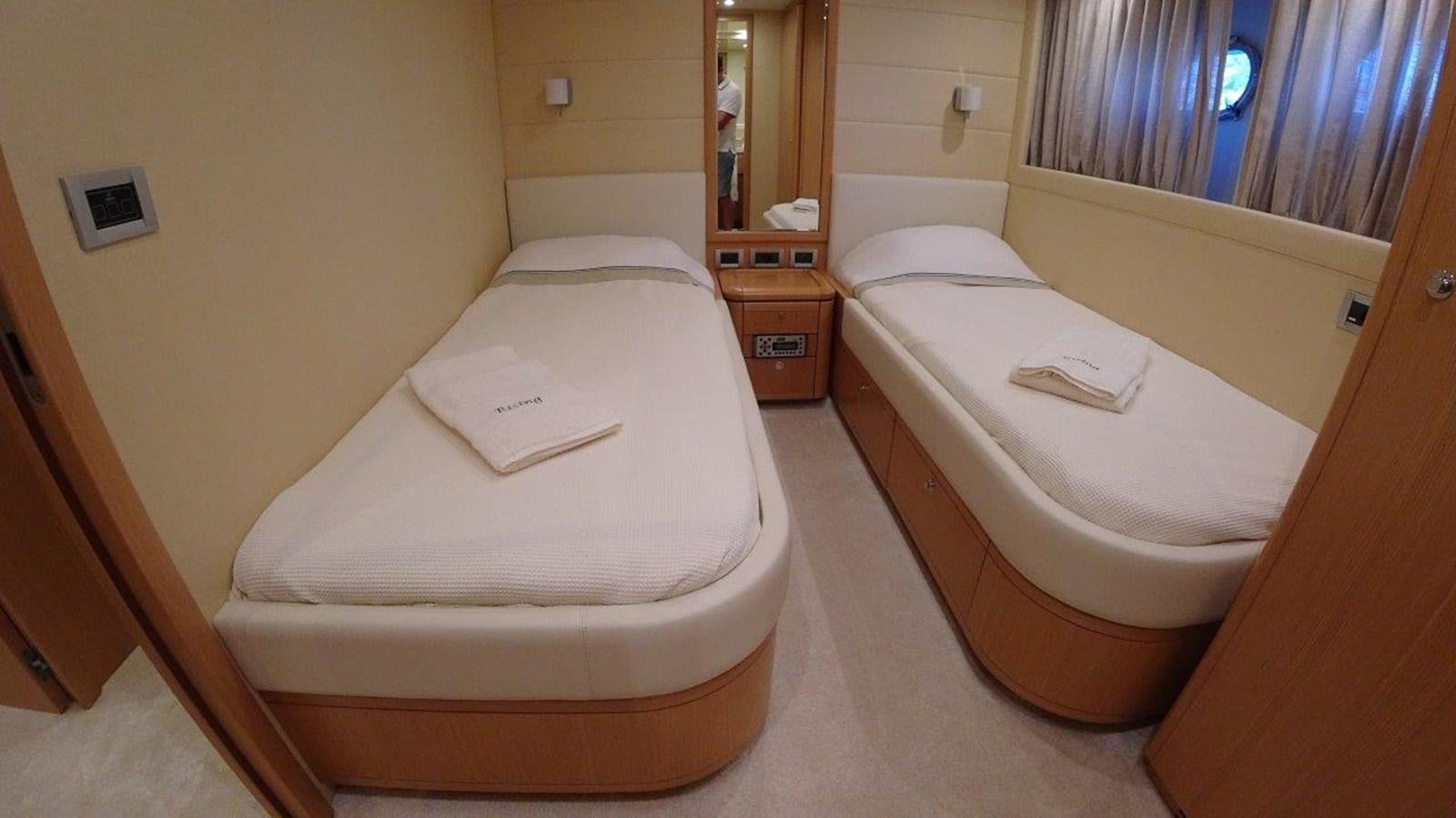 a room with two beds aboard CHUPRIANA Yacht for Sale