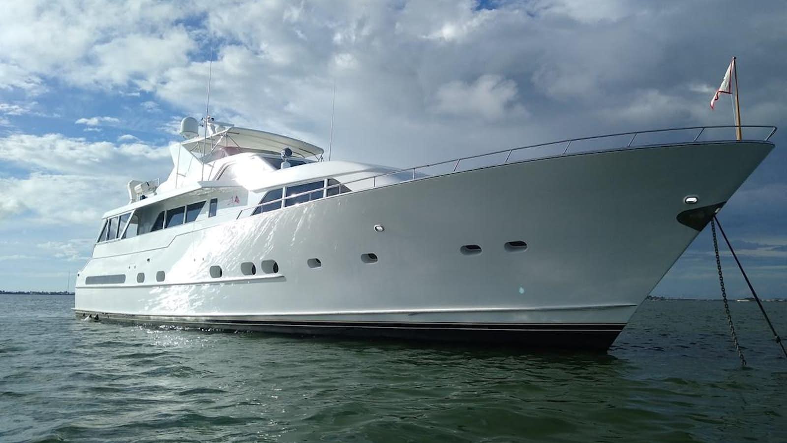 a white yacht in the water aboard MAC ATTACK Yacht for Sale
