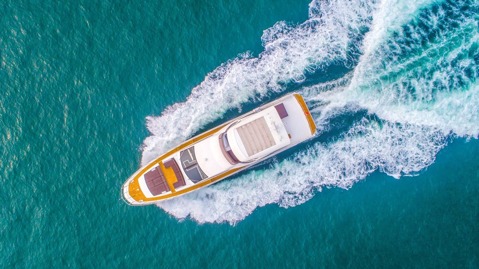 a boat in the water aboard AZIMUT 80 FLYBRIDGE Yacht for Sale