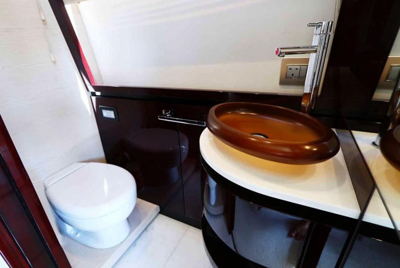 a bowl of soup on a table aboard AZIMUT 80 FLYBRIDGE Yacht for Sale