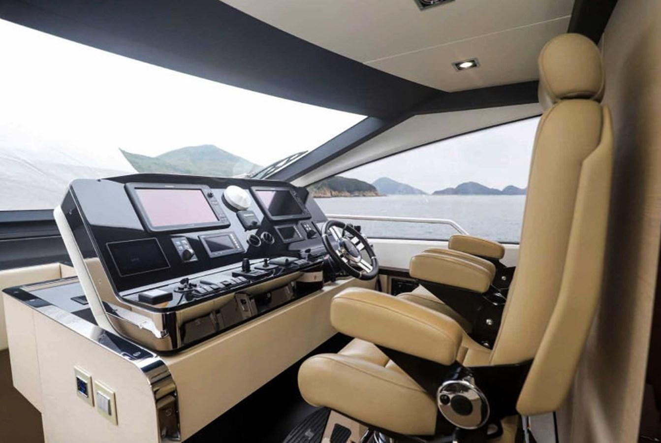 a car on the road aboard AZIMUT 80 FLYBRIDGE Yacht for Sale