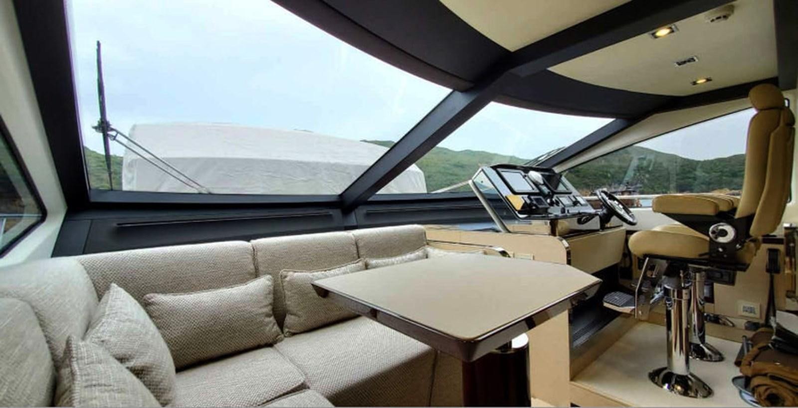 inside of a car aboard AZIMUT 80 FLYBRIDGE Yacht for Sale