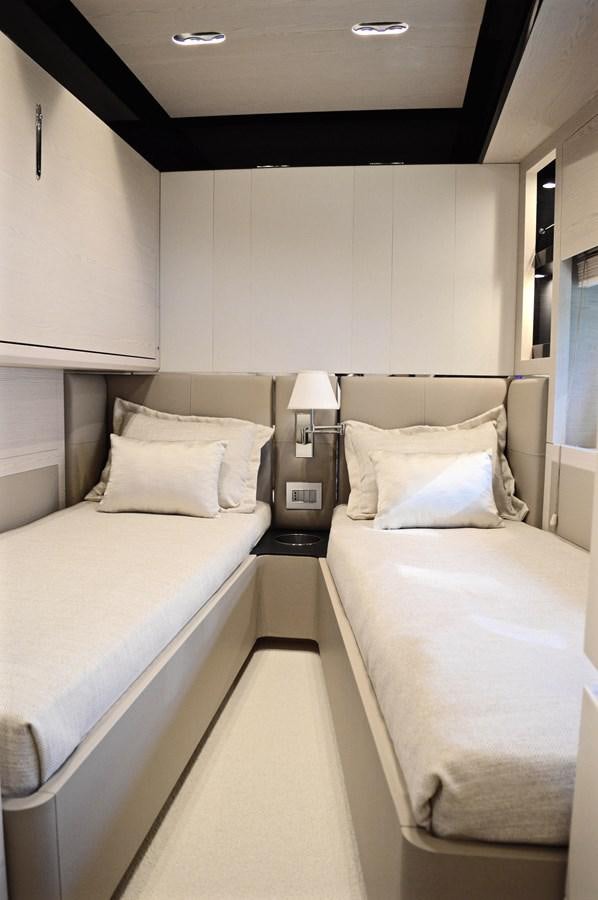 a couple of beds in a hotel room aboard MEMORIES Yacht for Sale