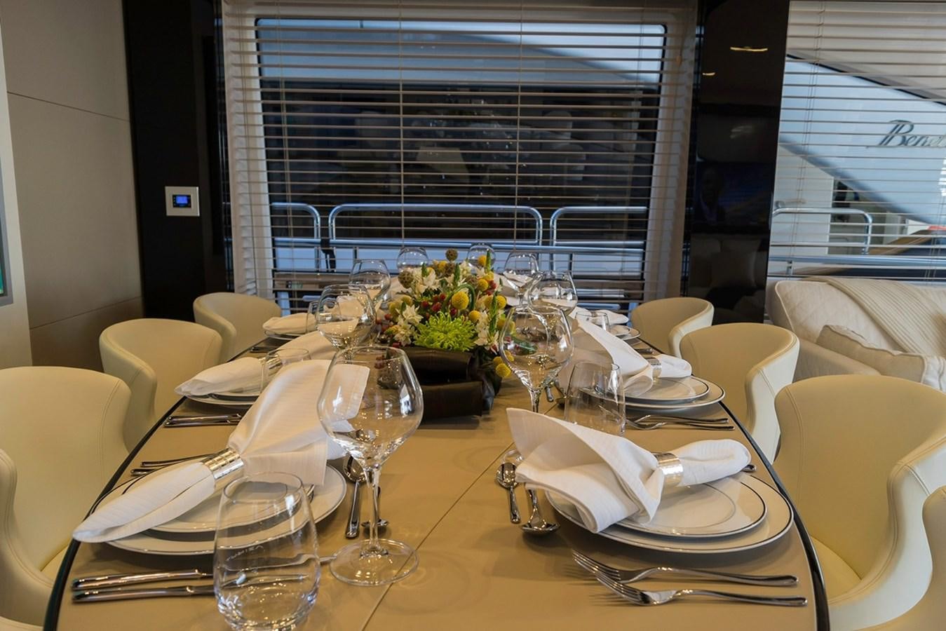 a table with place settings aboard MEMORIES Yacht for Sale