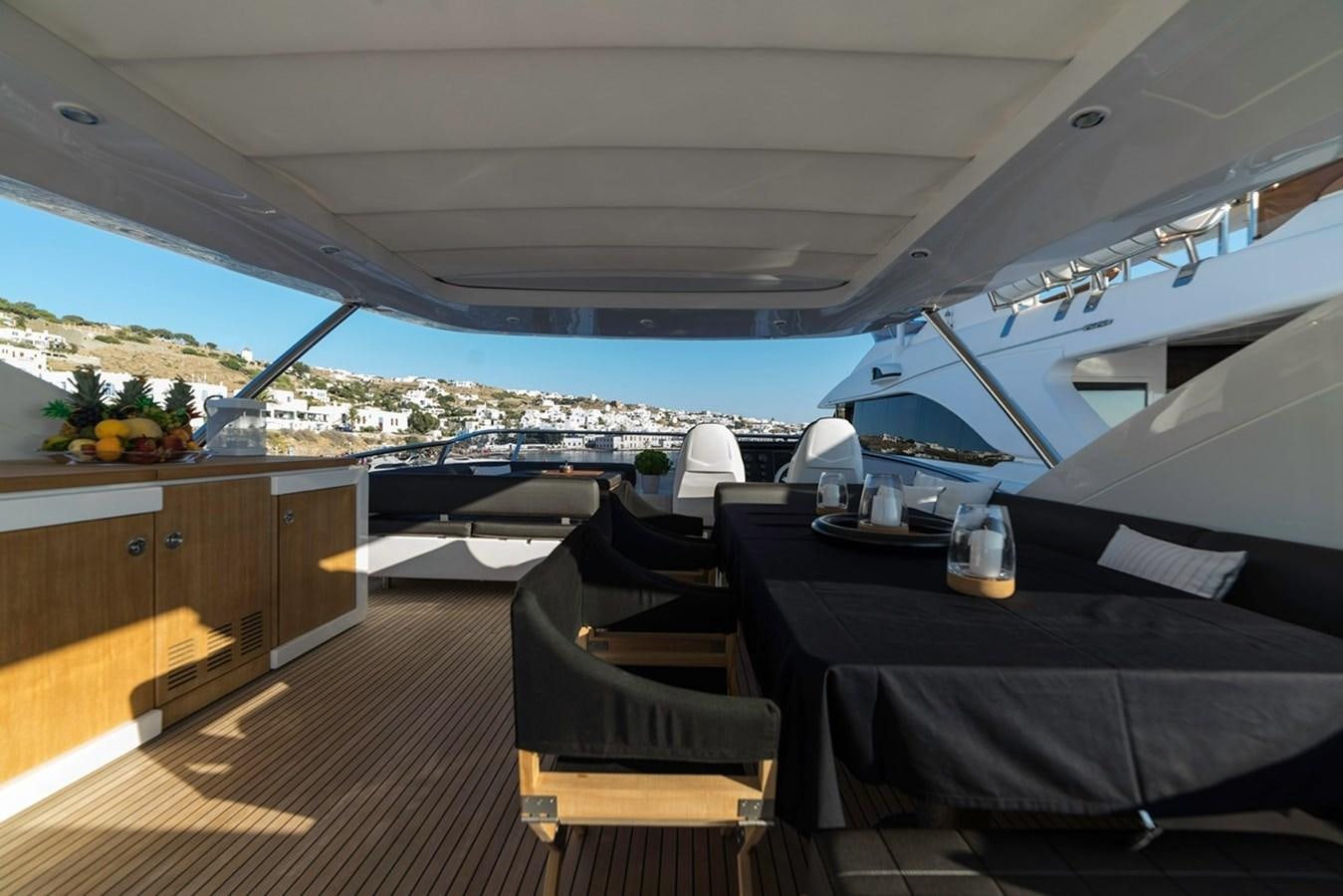a room with a table and chairs aboard MEMORIES Yacht for Sale