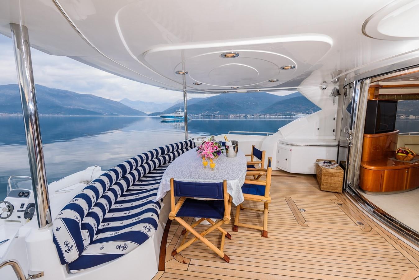 a tent with a table and chairs aboard BASYA NICOLI Yacht for Sale