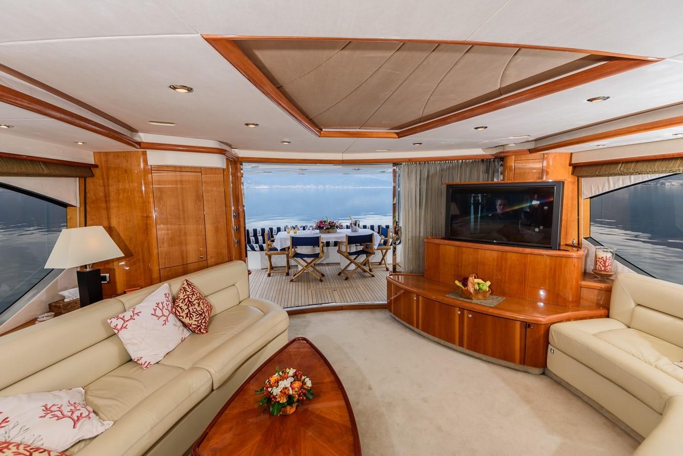 a living room with a large television aboard BASYA NICOLI Yacht for Sale