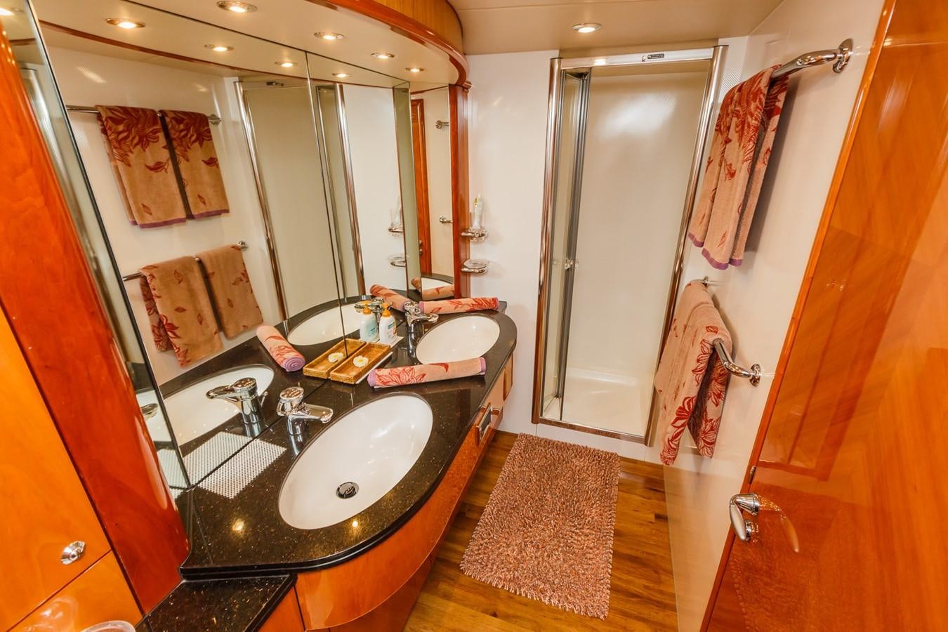a bathroom with a sink and a mirror aboard BASYA NICOLI Yacht for Sale