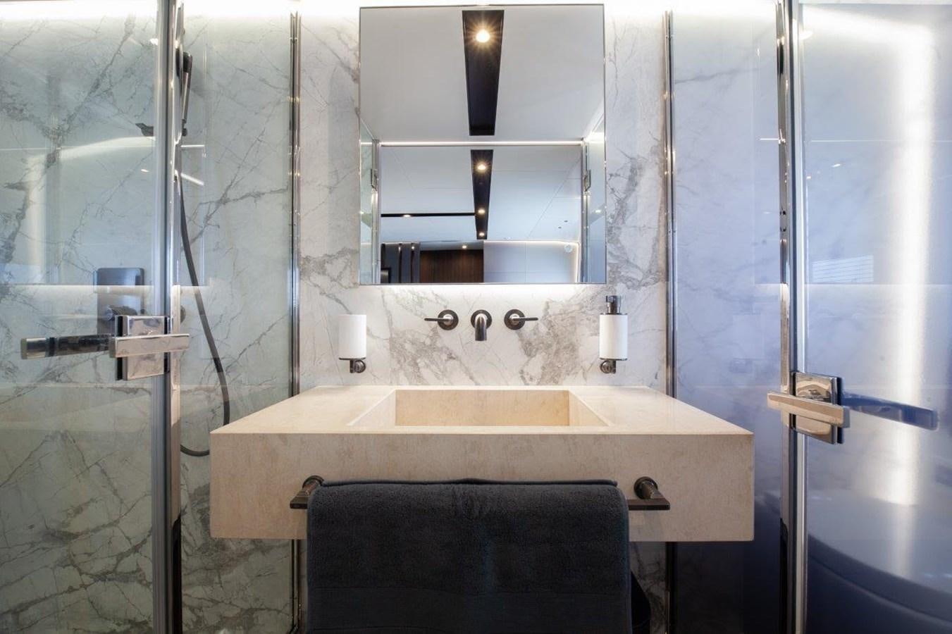 a bathroom with a sink and a mirror aboard 2021 ASTONDOA AS8 Yacht for Sale