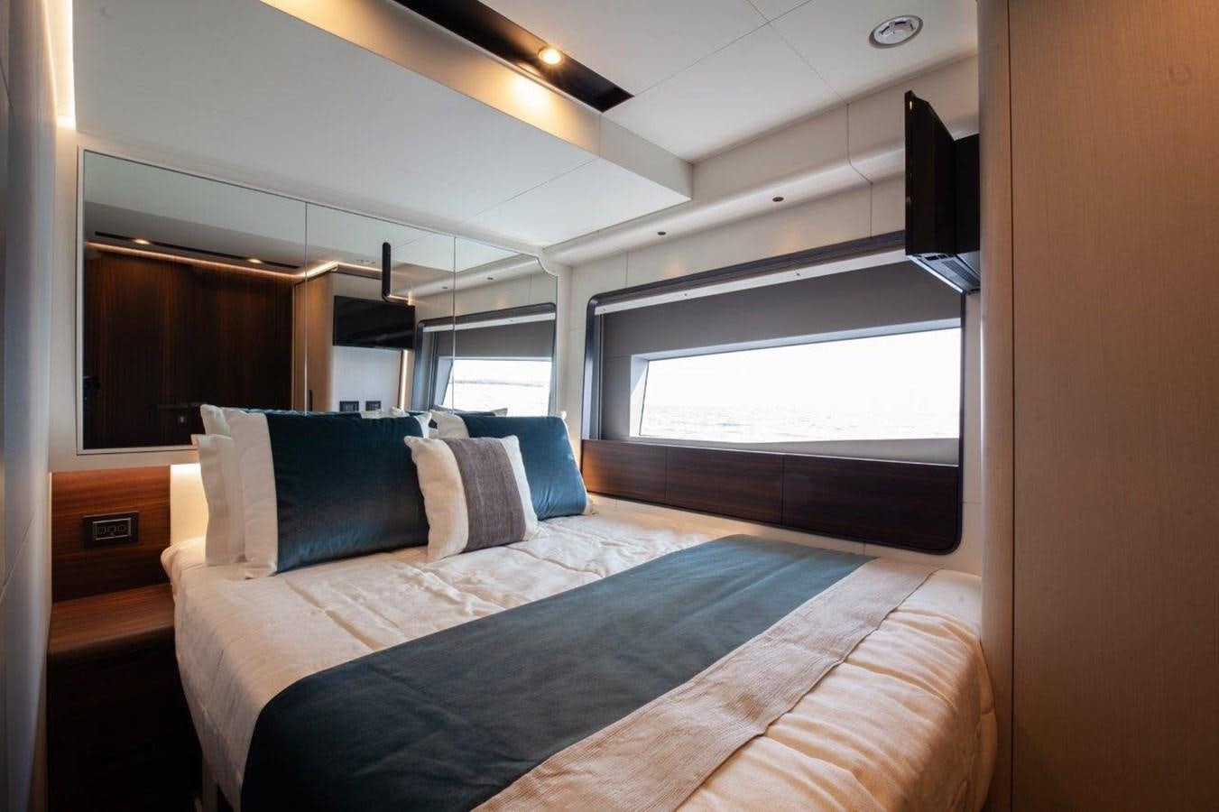 a bed with a pillow on it aboard 2021 ASTONDOA AS8 Yacht for Sale