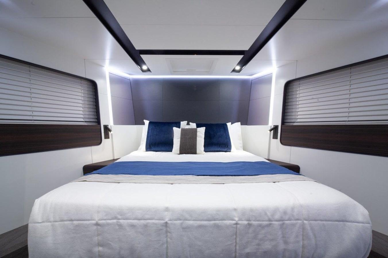 a bed in a room aboard 2021 ASTONDOA AS8 Yacht for Sale