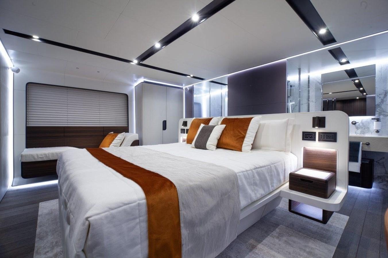 a room with a bed and a desk aboard 2021 ASTONDOA AS8 Yacht for Sale