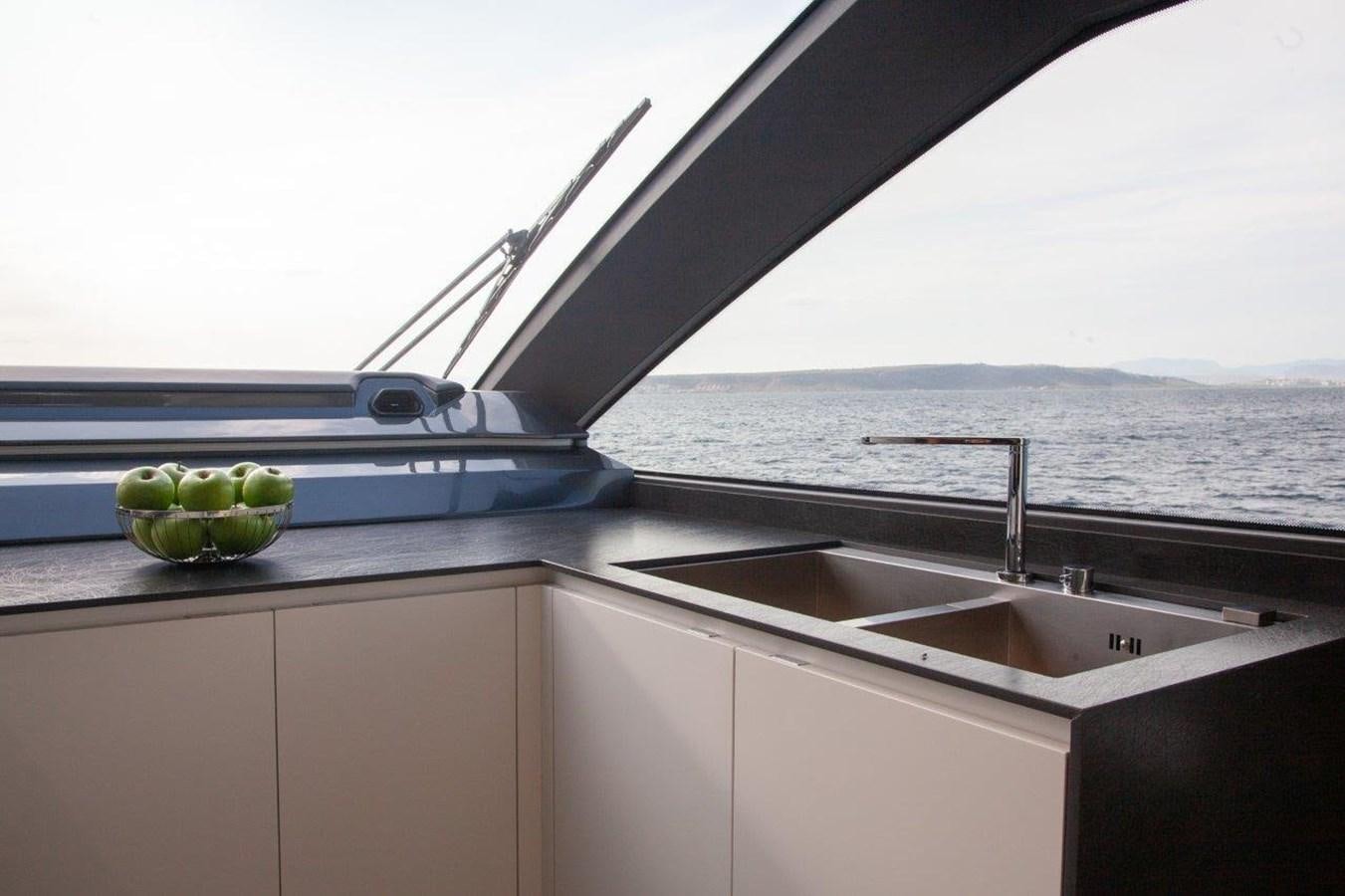 a kitchen with a sink and a window aboard 2021 ASTONDOA AS8 Yacht for Sale
