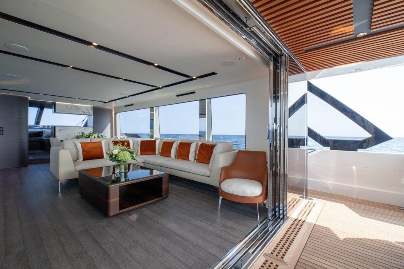 a living room with a couch and a table aboard 2021 ASTONDOA AS8 Yacht for Sale