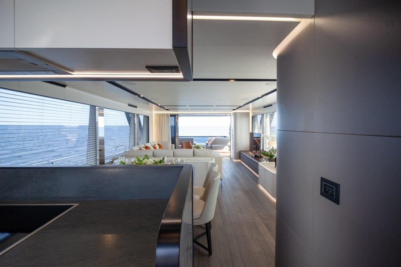 a room with a table and chairs aboard 2021 ASTONDOA AS8 Yacht for Sale