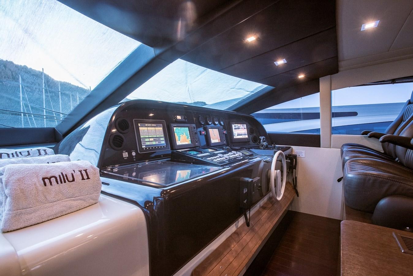 inside of a car aboard MILU II Yacht for Sale
